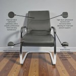 High back black visitor chair with cushioned seat, chrome armrests, and cantilever metal base